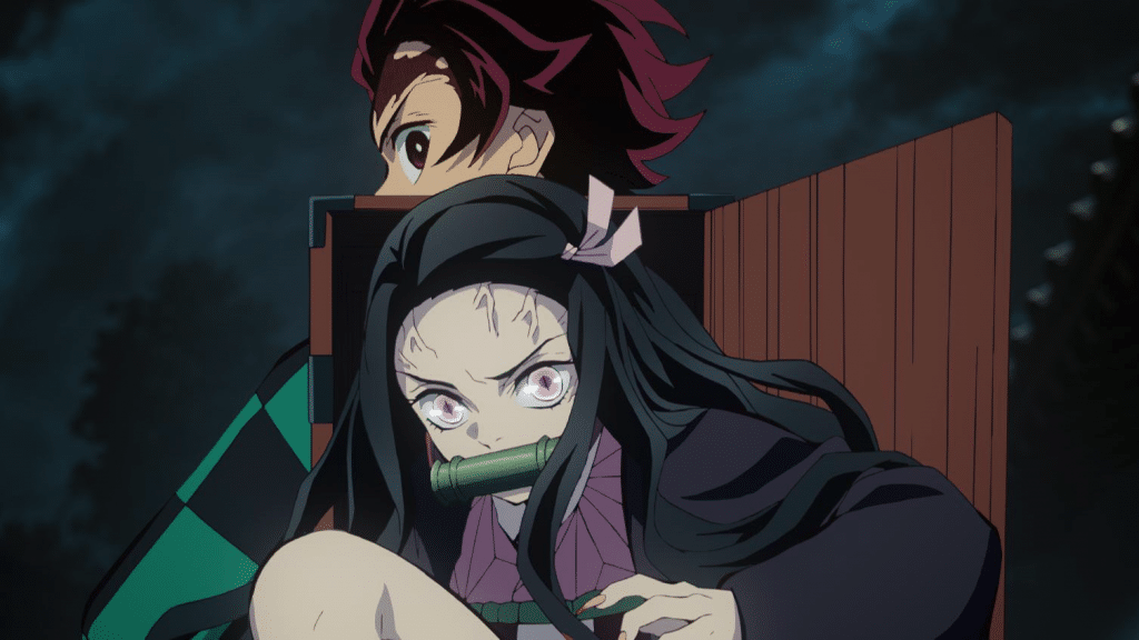 "Demon Slayer: Kimetsu no Yaiba" screenshot showing Nezuko emerging from Tanjiro's box.