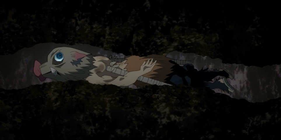 "Demon Slayer: Entertainment District Arc" screenshot showing Inosuke doing his best snake impression.