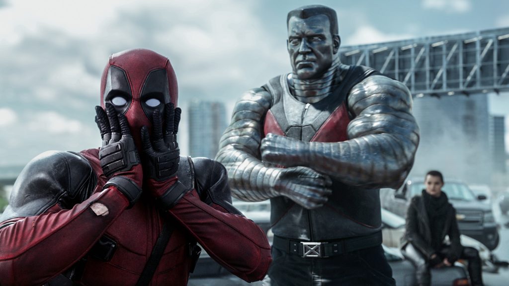 Deadpool (Ryan Reynolds) reacts to threats from Colossus (voiced by Stefan Kapicic).