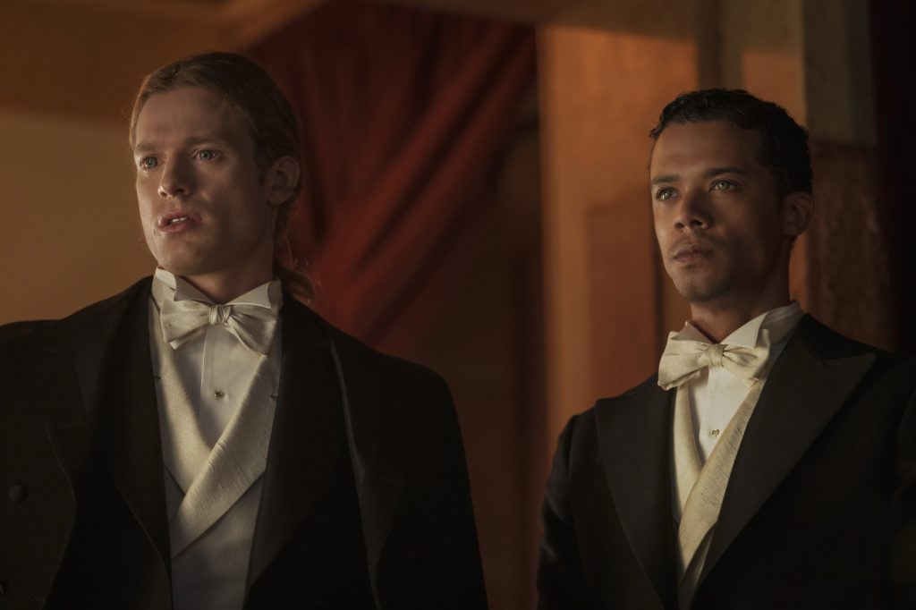 Lestat (Sam Reid) and Louis (Jacob Anderson) attend the opera in Interview with the Vampire