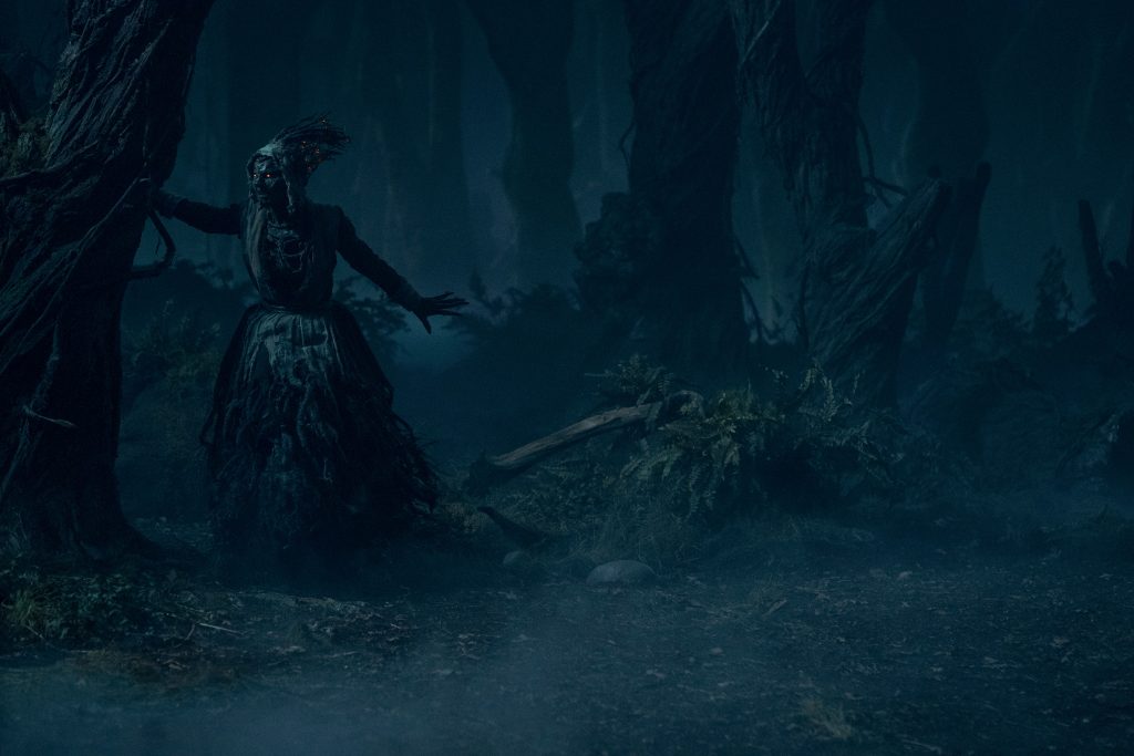 Lize Johnston as Keziah/Witch in episode “Dreams in the Witch House” of Guillermo del Toro's Cabinet Of Curiosities. Cr. Ken Woroner/Netflix © 2022