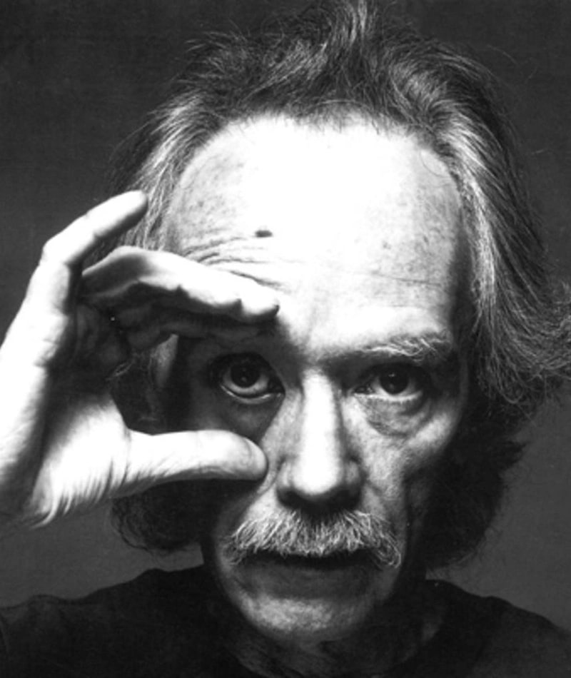 Black and white photo of John Carpenter. Image sourced from MUBI.