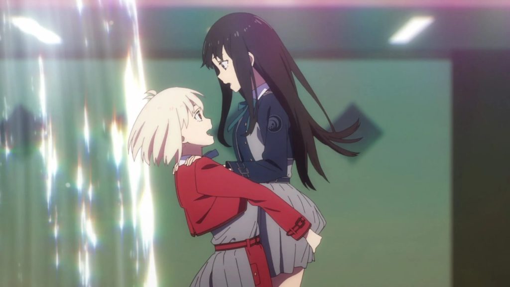 'Lycoris Recoil' anime screenshot showing the first time Chisato picked up and spun Takina around in a very yuri gesture.