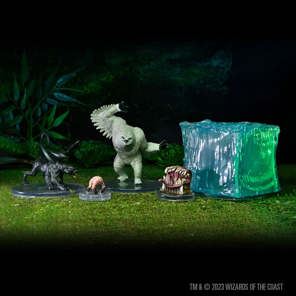 'Dungeons & Dragons: Honor Among Thieves' x WizKids collaboration miniature boxed set against a forested background.