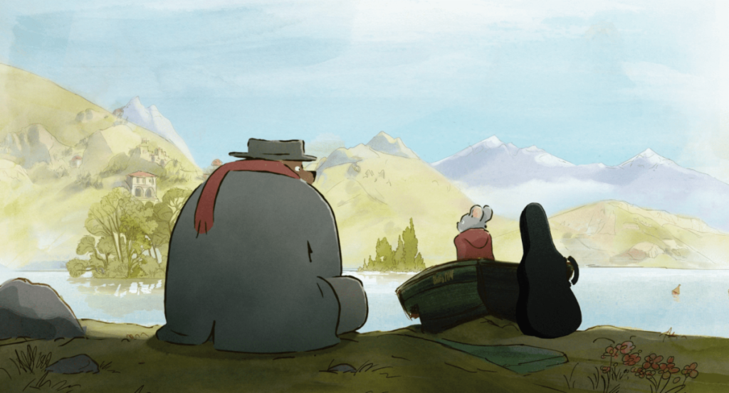'Ernest & Celestine: A Trip to Gibberita' screenshot showing Ernest and Celestine sitting comfortably next to each other on a riverbank.