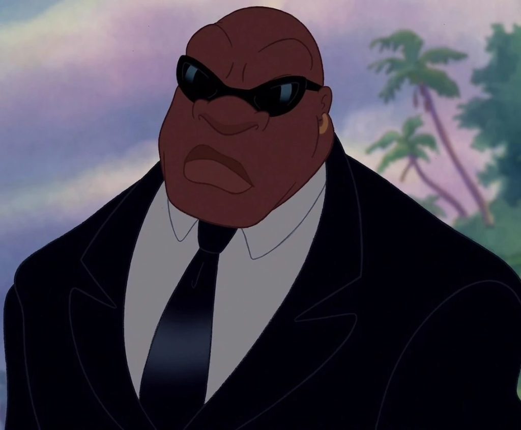 'Lilo & Stitch' screenshot depicting Cobra Bubbles in full scary mode...even though he's not actually doing anything.