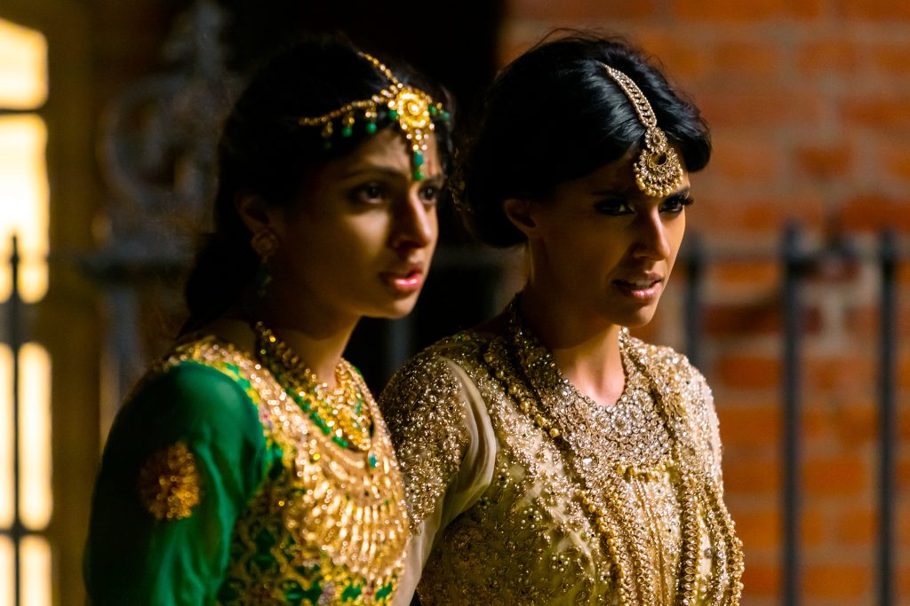 Priya Kansara as Ria Khan and Ritu Arya as her sister Lena in director Nida Manzoor’s POLITE SOCIETY, a Focus Features release. Credit: Saima Khalid / © 2023 FOCUS FEATURES LLC.