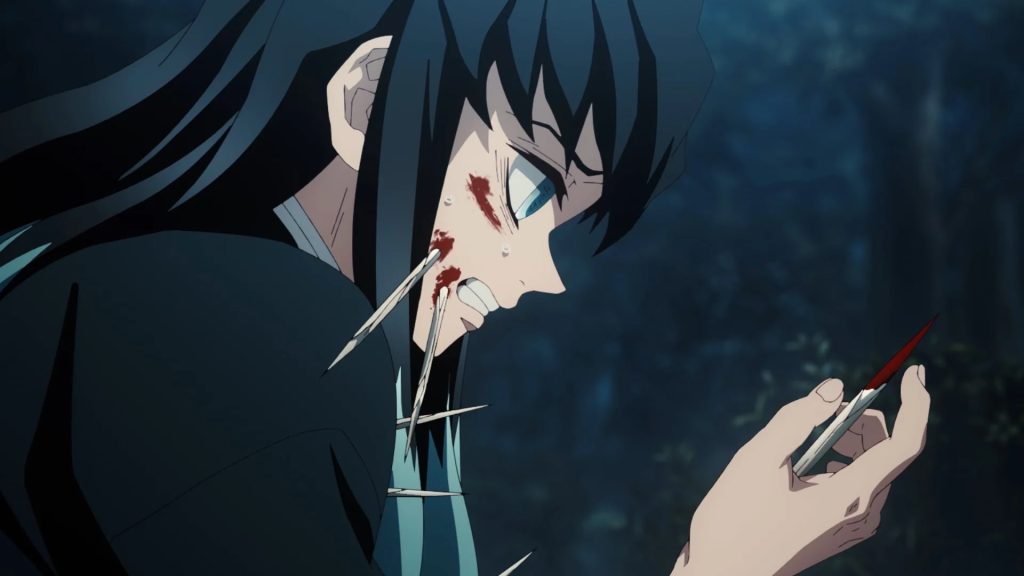 Demon Slayer: Kimetsu no Yaiba – Swordsmith Village Arc Ep. 8 "The Mu in Muichiro" screenshot depicting Muichiro holding one of Gyokko's bloody needles he just yanked out of his face.