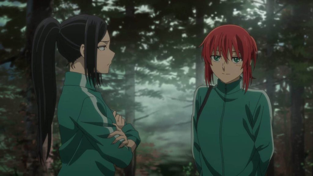 'The Ancient Magus' Bride' season 2 Ep. 7 "Slow and sure. I" screenshot depicting Chise smiling at Lucy with a small blush as they're camping outdoors.