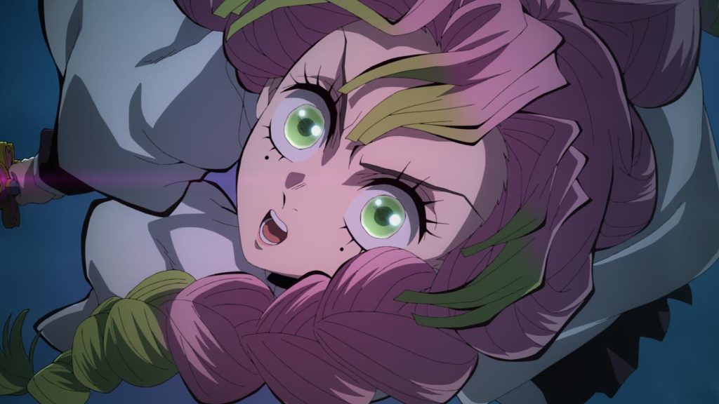 Demon Slayer: Kimetsu No Yaiba – Swordsmith Village Arc Ep. 10 "Love Hashira Mitsuri Kanroji" screenshot depicting a determined Mitsuri in the middle of an all-out offensive.