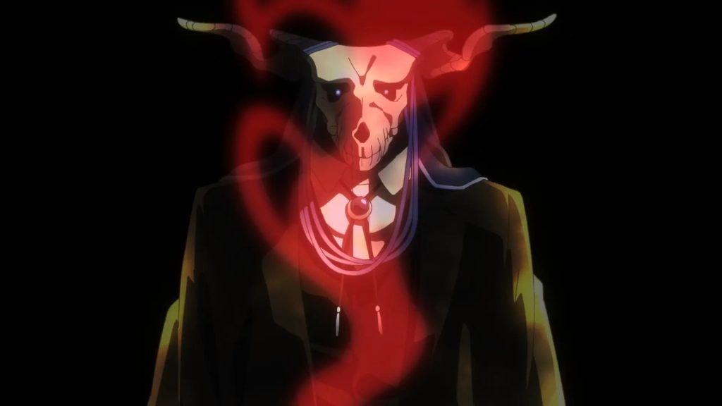 The Ancient Magus' Bride season 2 Ep. 11 "A small leak will sink a great ship. I" screenshot depicting Elias standing against a black background with wisps of red smoke in front of him.