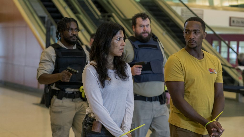 TWISTED METAL -- "NTHLAW1" Episode 103 -- Pictured: (l-r) Tahj Vaughans as Mike, Stephanie Beatriz as Quiet, Mike Mitchell as Stu, Anthony Mackie as John Doe  -- (Photo by: Skip Bolen/Peacock)