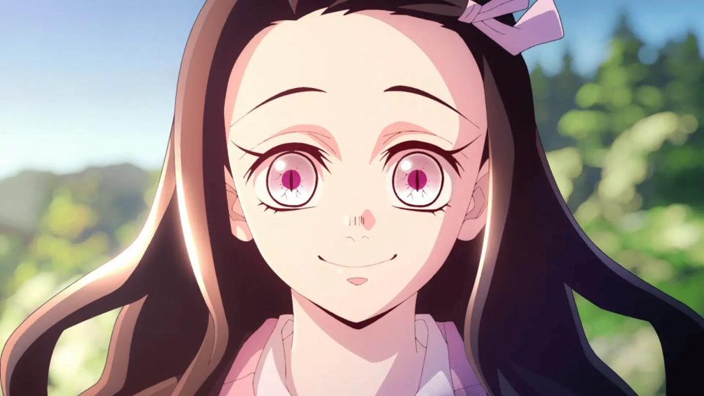 Demon Slayer: Kimetsu no Yaiba – Swordsmith Village Arc Ep. 11 "A Connected Bond: Daybreak and First Light" screenshot depicting Nezuko standing in the sun and smiling brightly with no gag in sight.