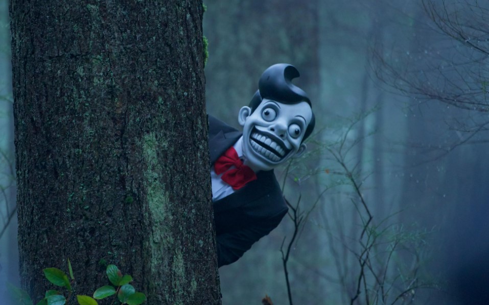 Mr. Chuckleteeth looks out from behind a tree in the X-Files revival episode "Familiar"