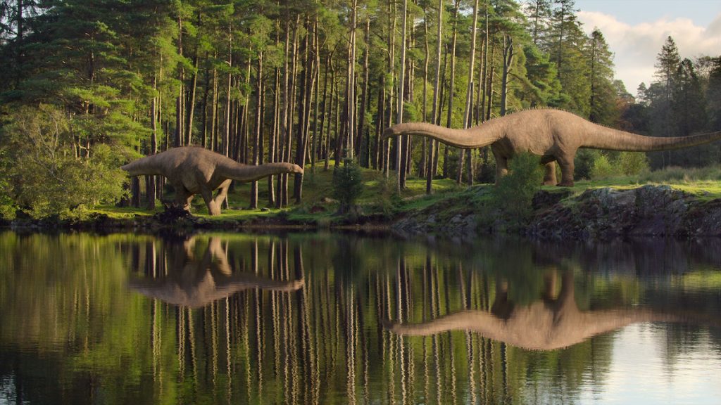 Life on Our Planet first look image featuring sauropods at a lake.