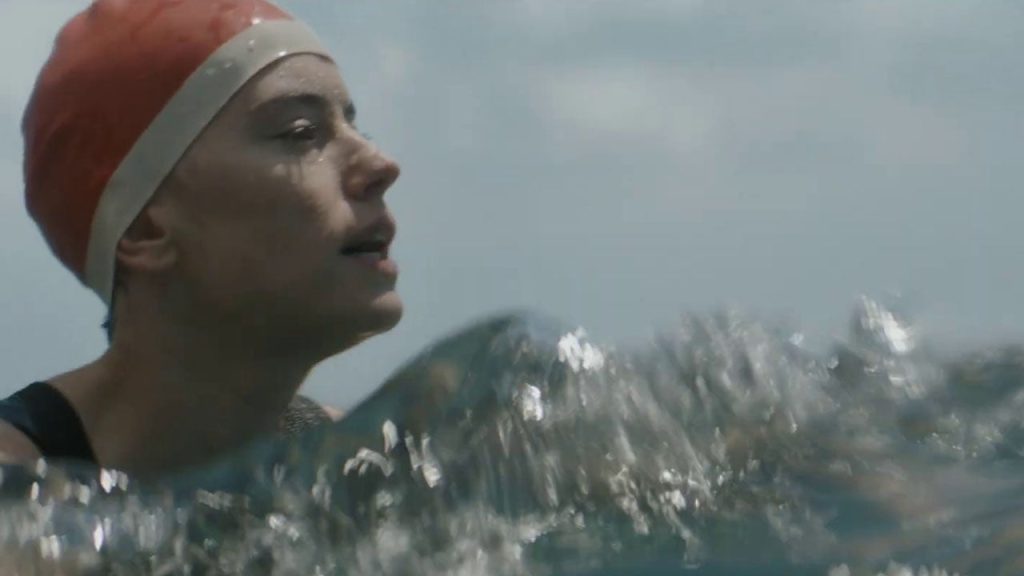 Daisy Ridley swimming in Young Woman and the Sea. 