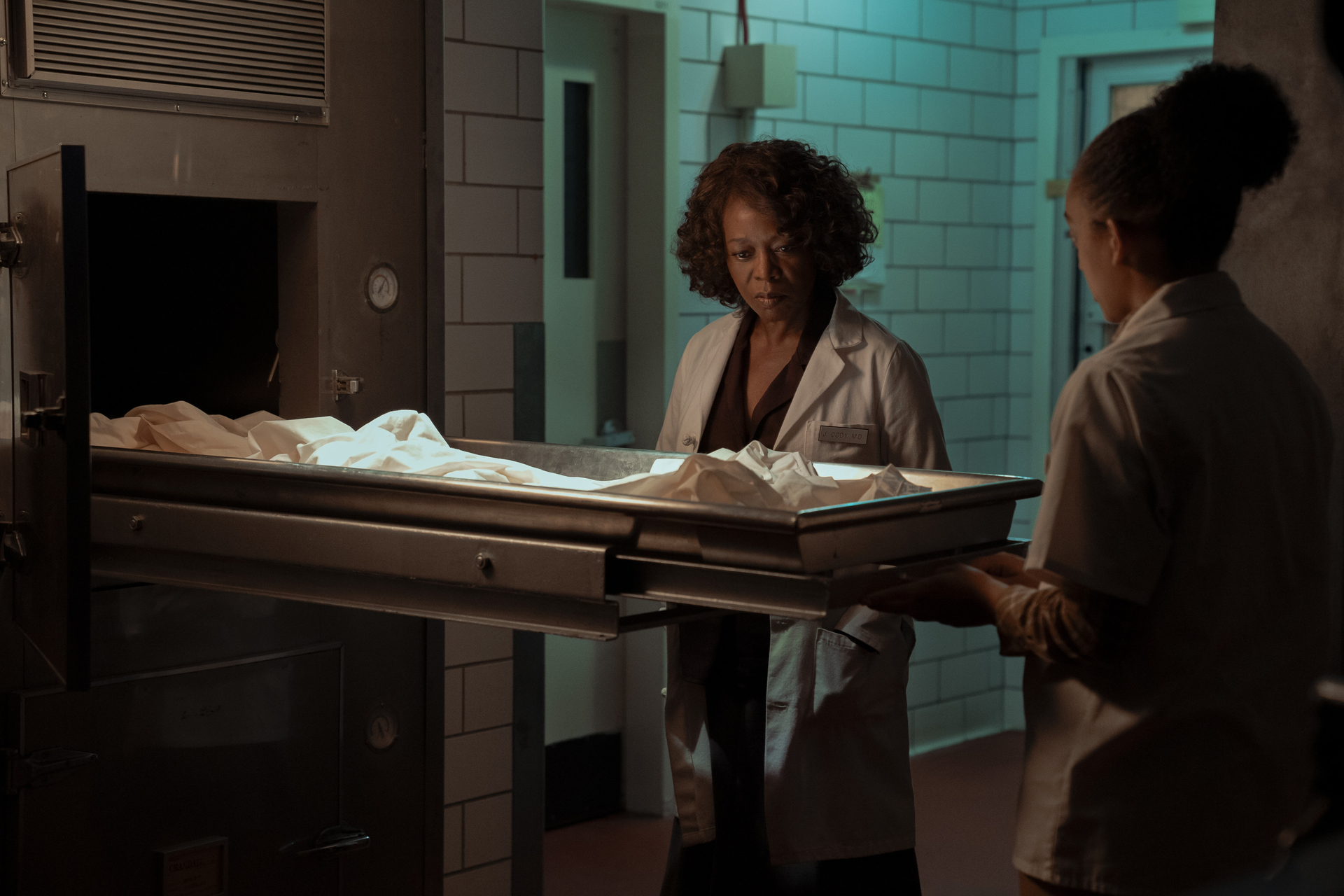 Dr. Cody (Alfre Woodard) examines an empty morgue bed in 'Salem's Lot'