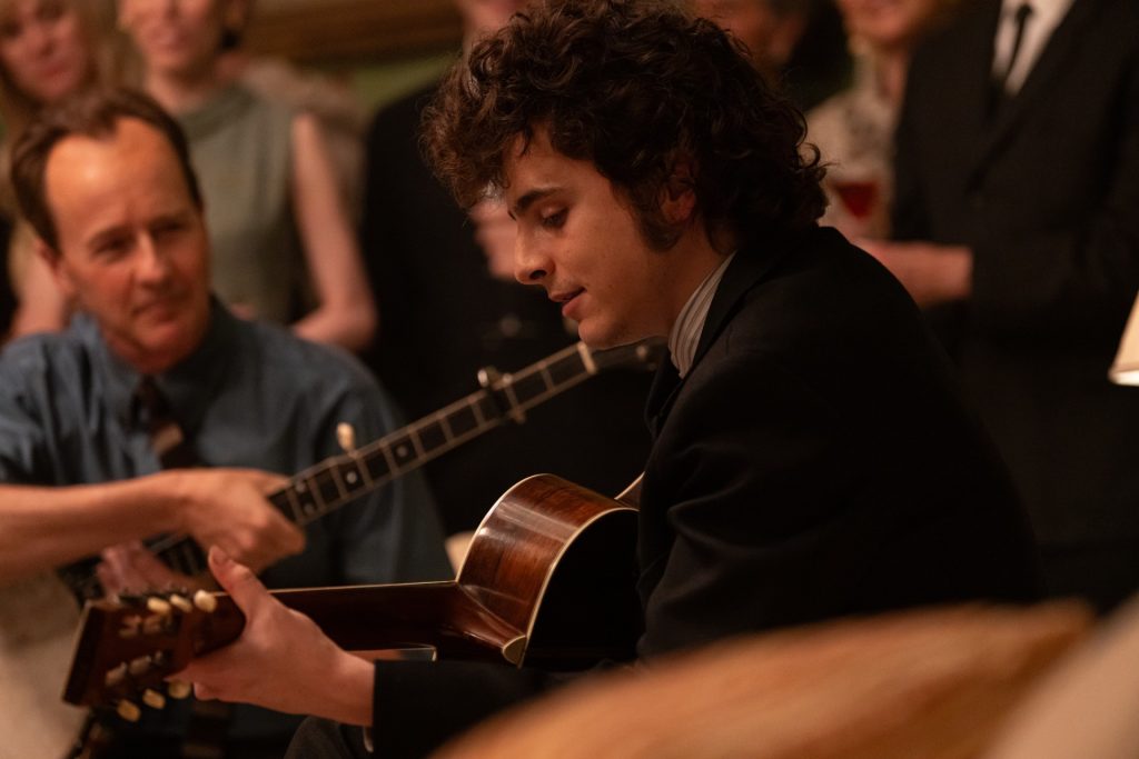 Ed Norton as Pete Seeger and Timothee Chalamet as Bob Dylan